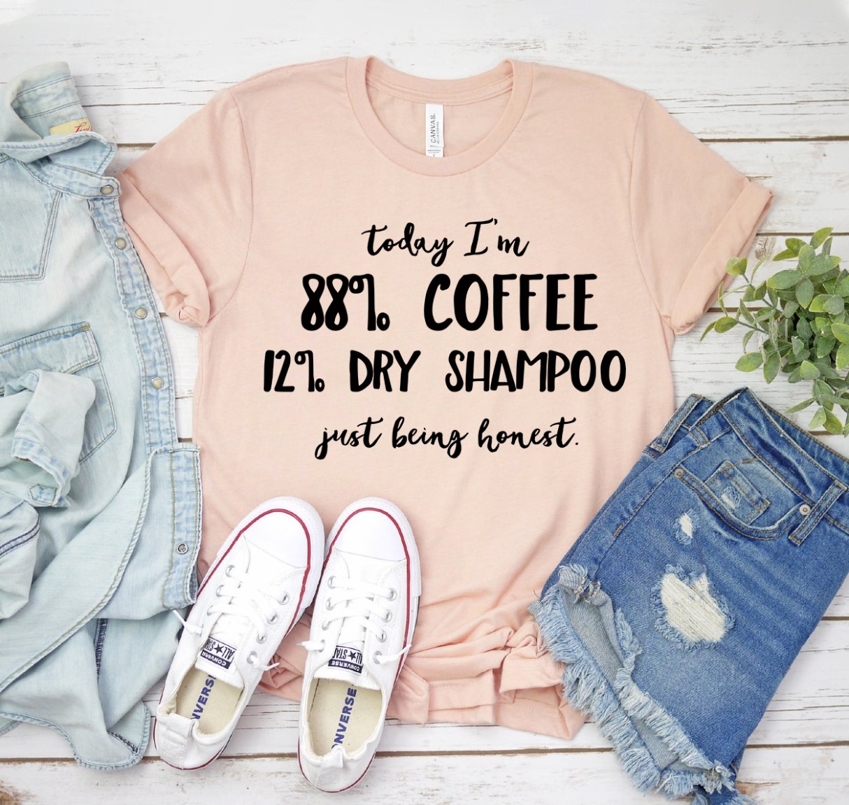 A humorous t-shirt featuring the text 'Today I'm 88% Coffee And 12 Percent Dry Shampoo', made from soft ring spun cotton.